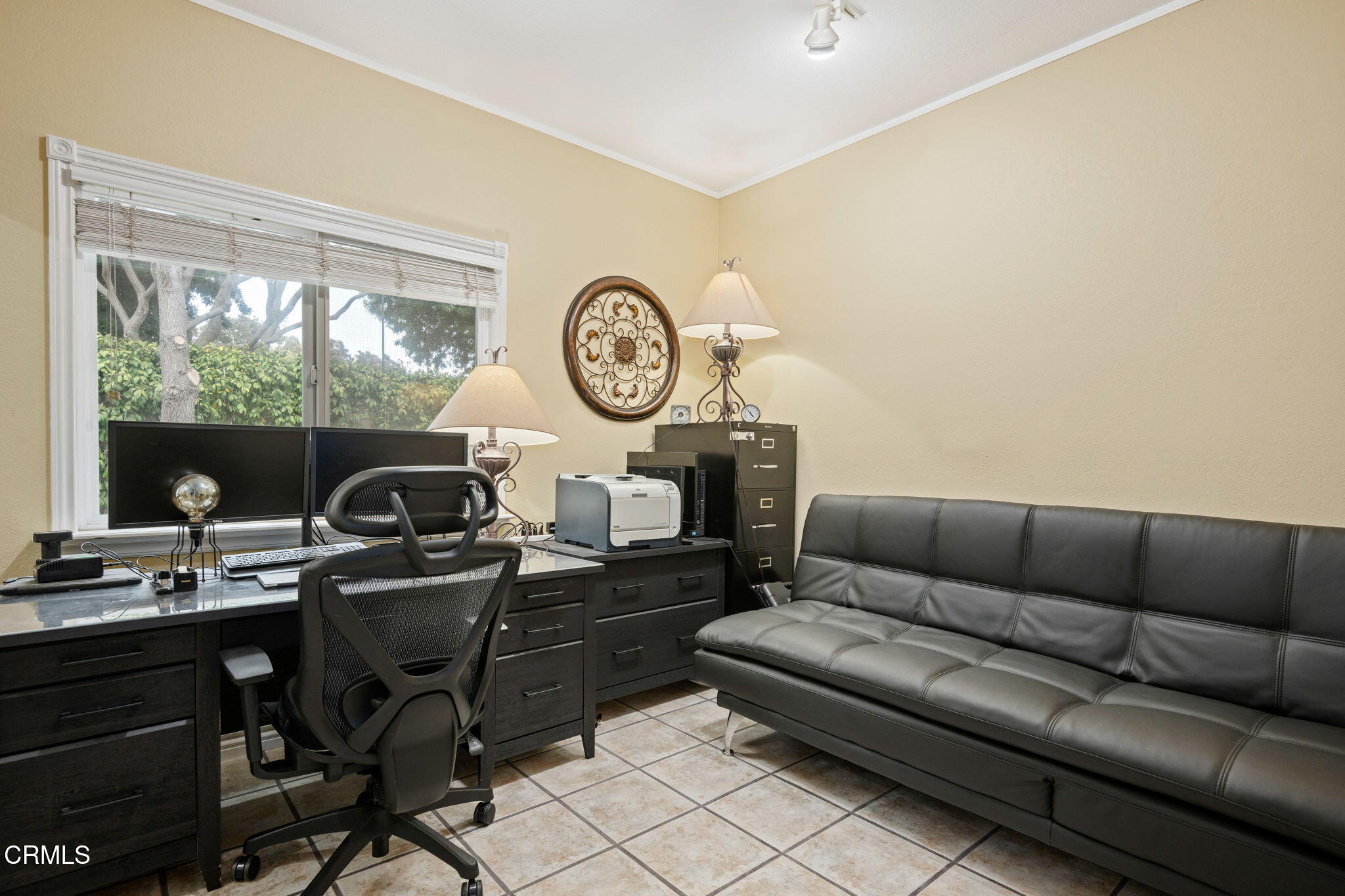 1501 Devonshire Drive Oxnard, CA 93030 - Photo 24 of 39 a living room with furniture a flat screen tv and a large window