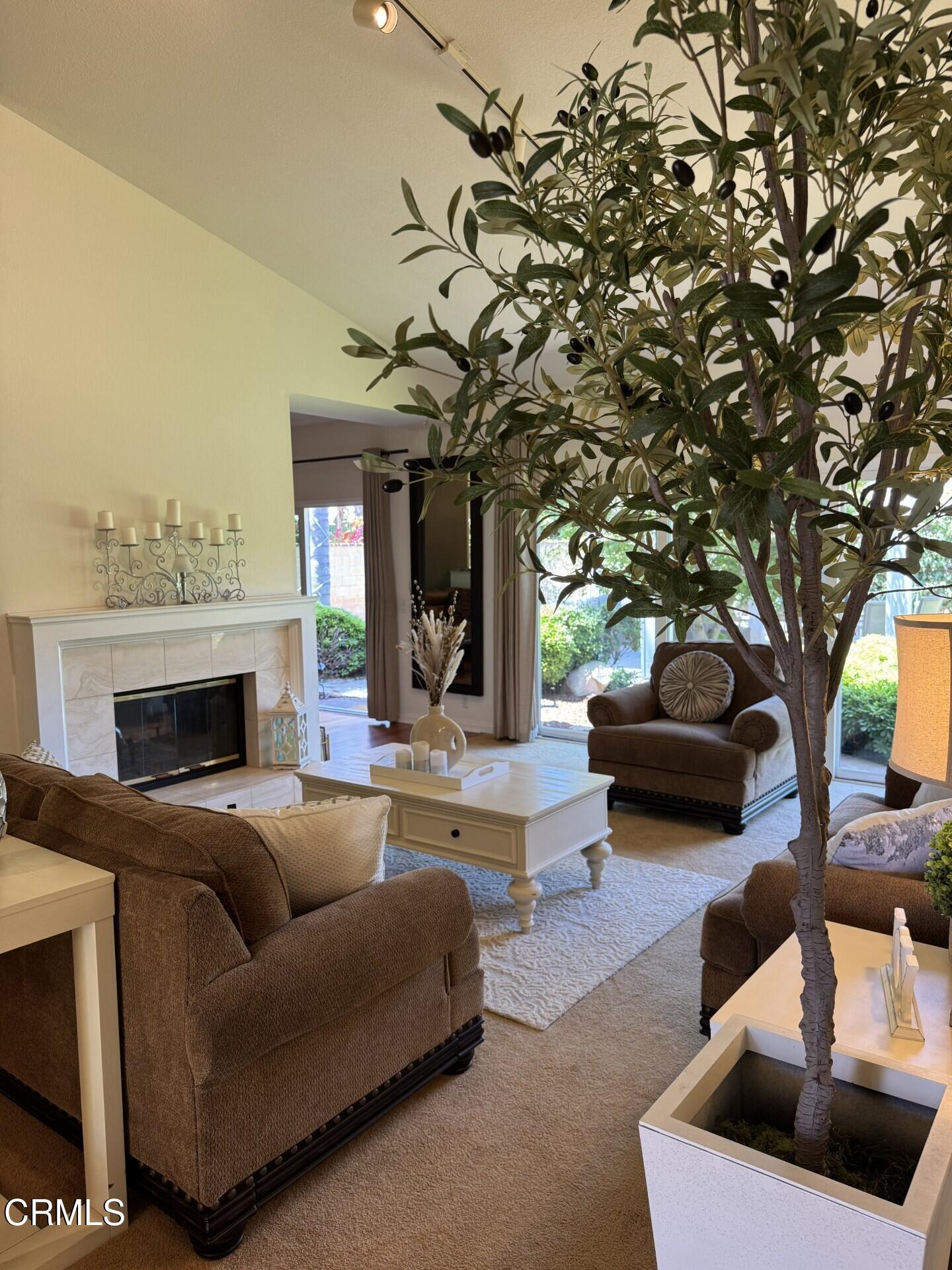 1501 Devonshire Drive Oxnard, CA 93030 - Photo 34 of 39 a living room with furniture and a fireplace