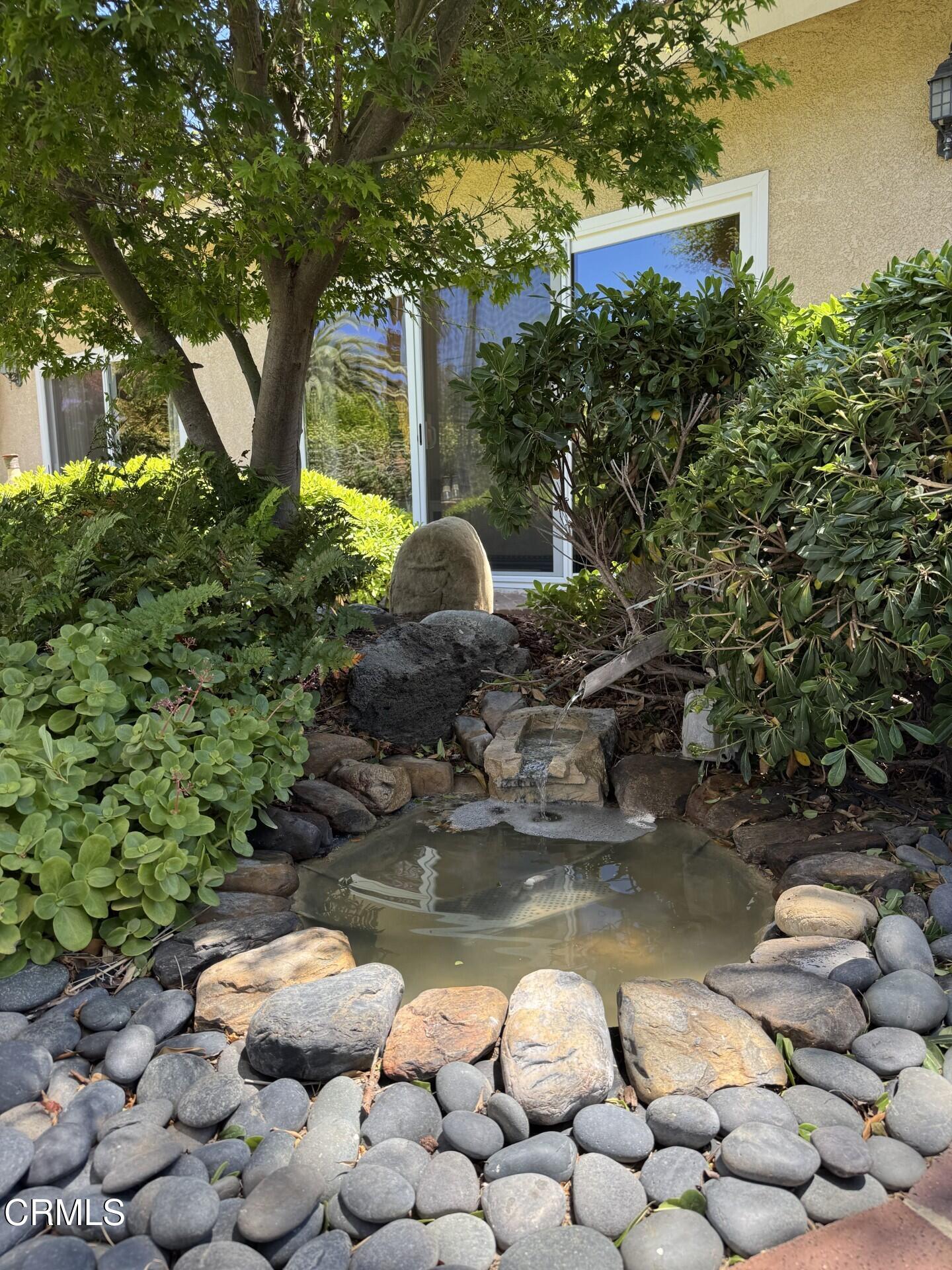 1501 Devonshire Drive Oxnard, CA 93030 - Photo 35 of 39 a backyard of a house with lots of green space