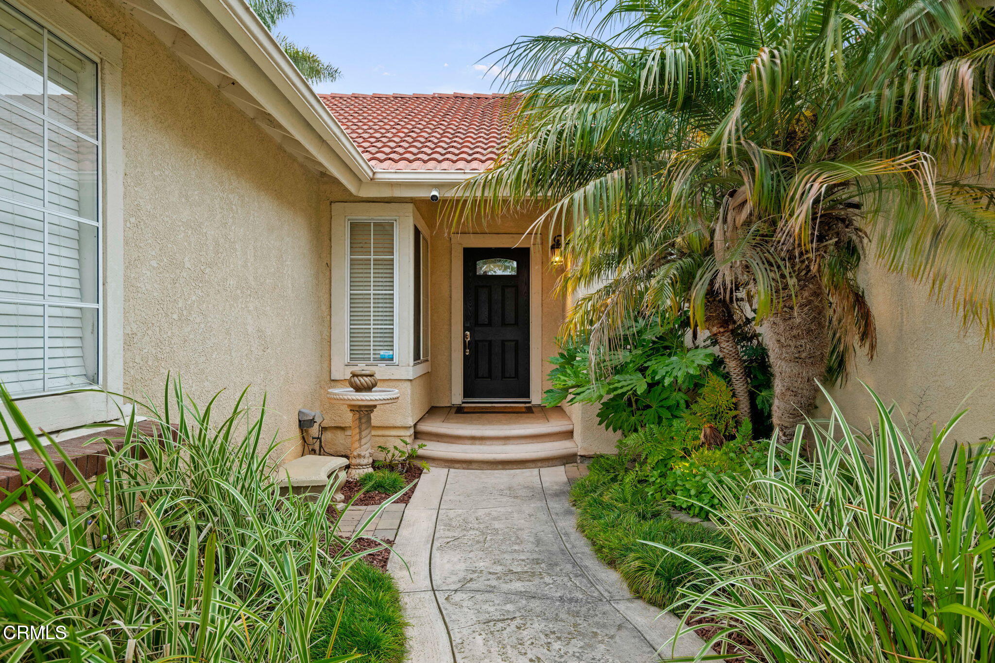 1501 Devonshire Drive Oxnard, CA 93030 - Photo 7 of 39 a front view of a house with a yard