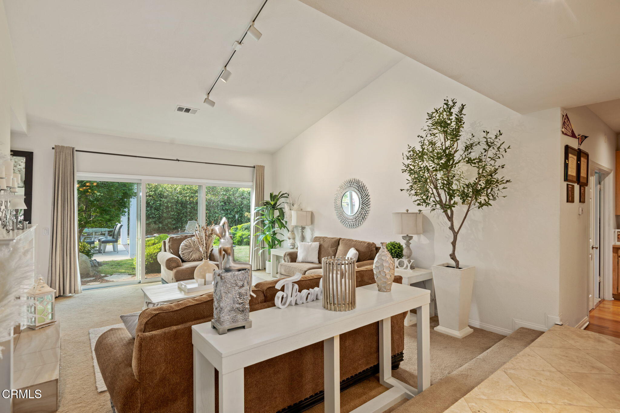 1501 Devonshire Drive Oxnard, CA 93030 - Photo 8 of 39 a living room with furniture and a large window