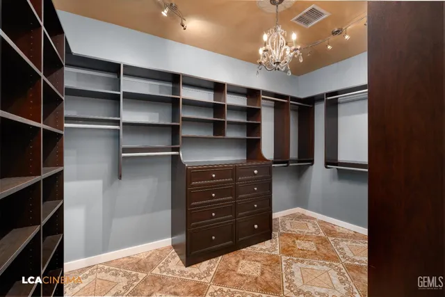 a view of a livingroom with furniture and closet