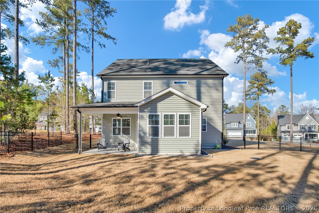 224 Timber Skip Drive Spring Lake, NC 28390 - Photo 28 of 30 a view of a house with a yard