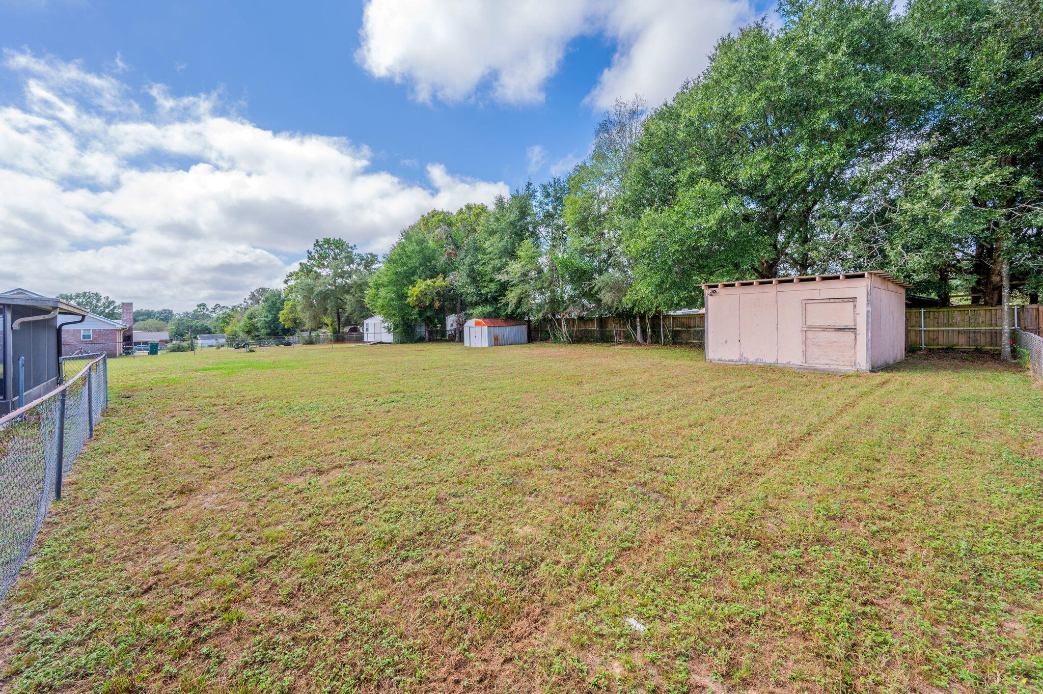 5356 Constitution Road Crestview, FL 32539 - Photo 29 of 32 a view of a tree with a yard