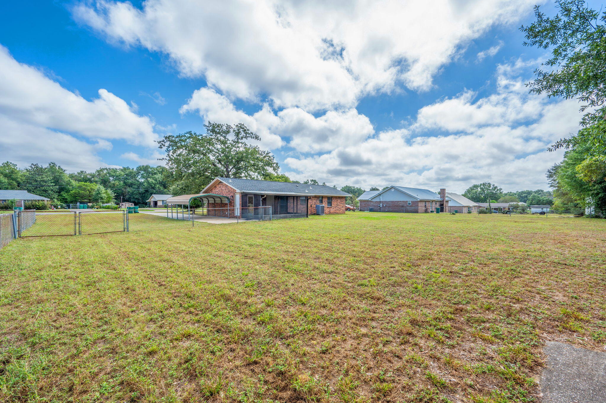 5356 Constitution Road Crestview, FL 32539 - Photo 6 of 32 a front view of a house with a yard