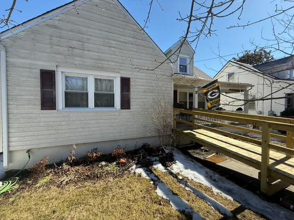 a view of a house with a roof deck
