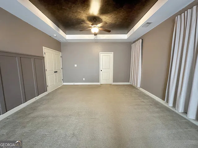 a view of a livingroom with a staircase