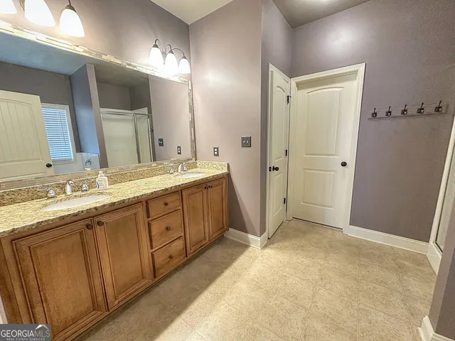 a view of a bathroom from a hallway