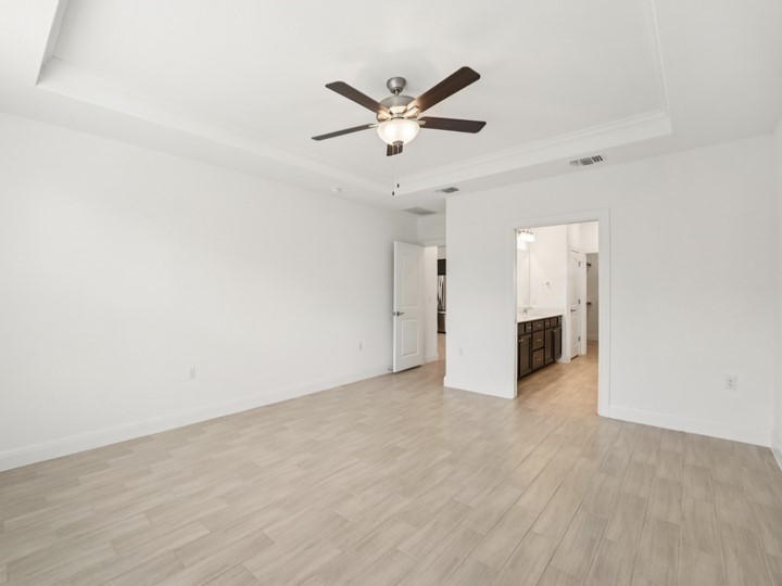 312 Kitty Hawk Road Georgetown, TX 78633 - Photo 15 of 37 a view of an empty room with a ceiling fan