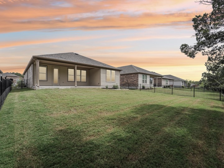 312 Kitty Hawk Road Georgetown, TX 78633 - Photo 2 of 37 a view of a house with a yard
