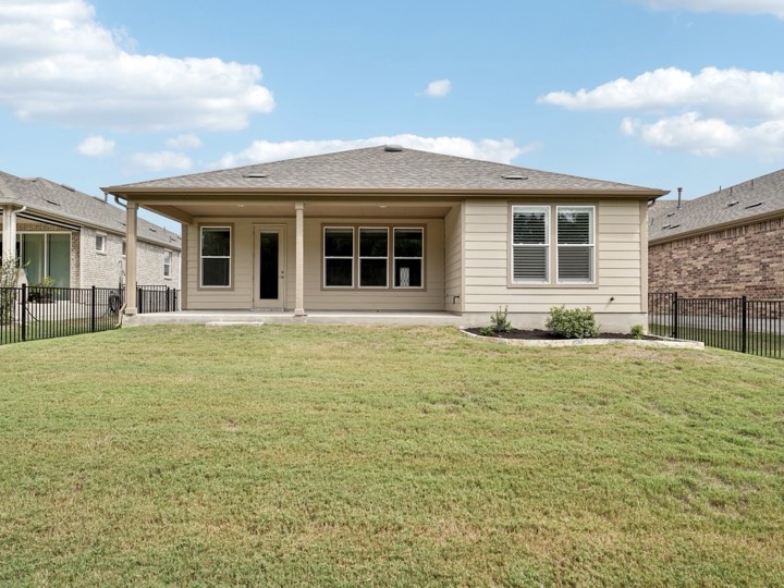 312 Kitty Hawk Road Georgetown, TX 78633 - Photo 32 of 37 a front view of a house with a garden
