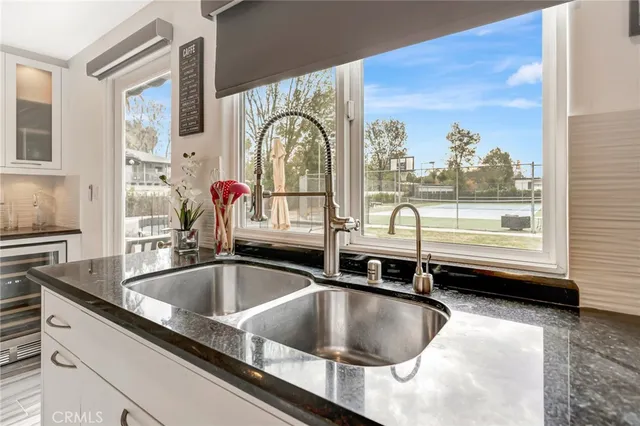 a bedroom with a large bed and a walk in closet