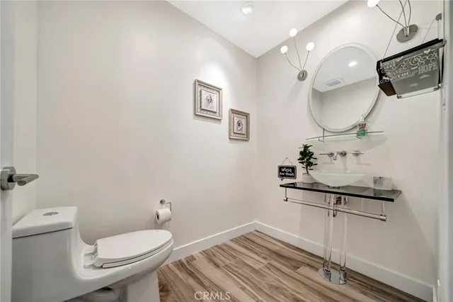a spacious bathroom with a granite countertop tub and a large window
