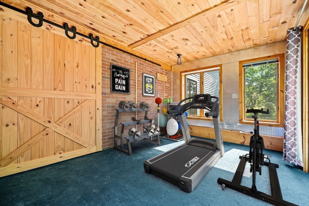 3 Whitman Place Beverly, MA 01915 - Photo 24 of 34 a room with gym equipment and large window