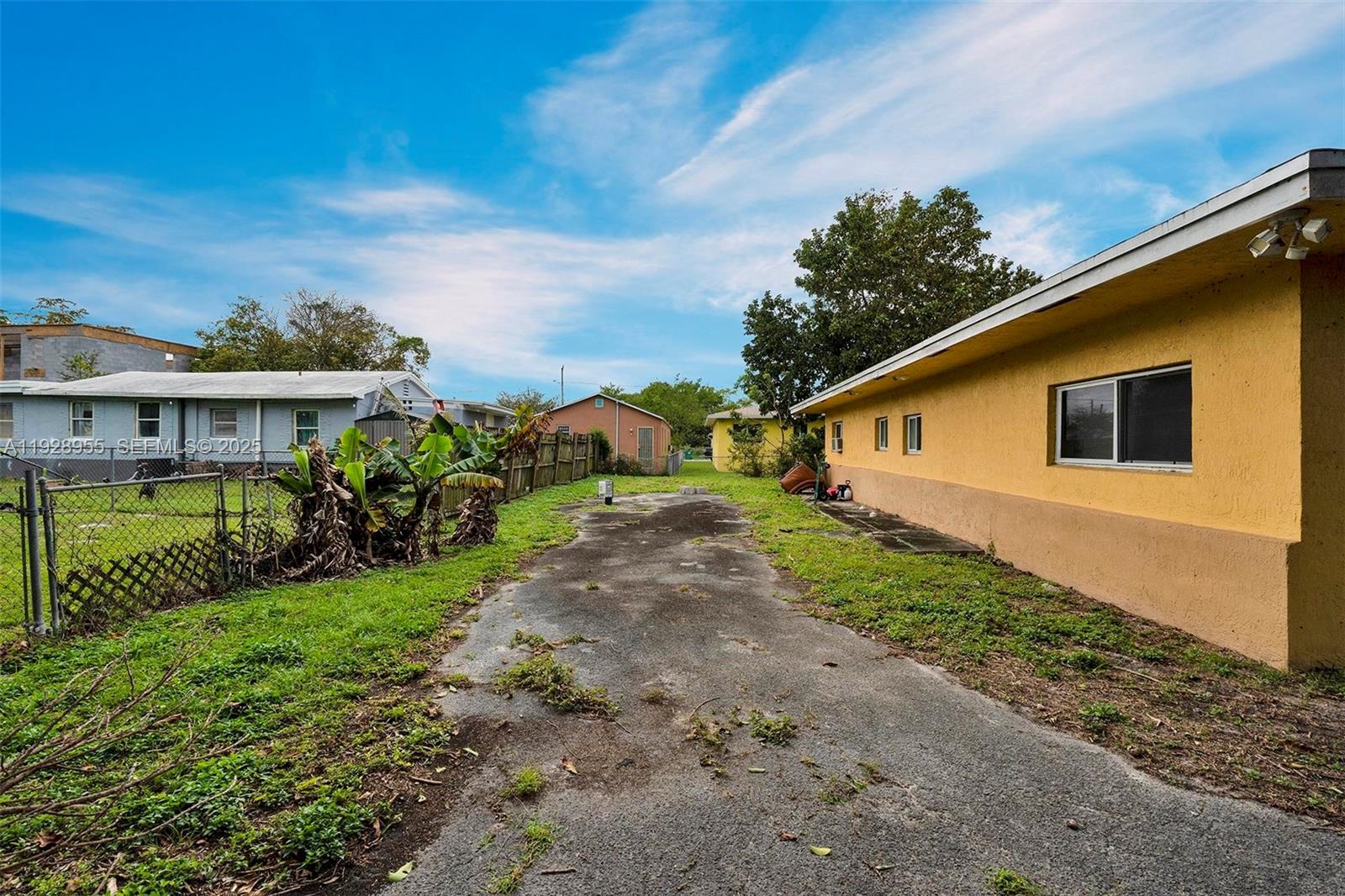 1910 Northwest 72nd Street Miami, FL 33147 - Photo 28 of 37 a view of a house with a yard