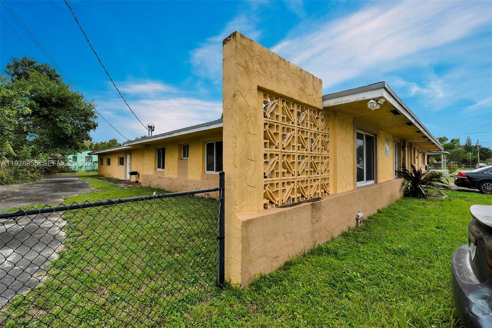 1910 Northwest 72nd Street Miami, FL 33147 - Photo 29 of 37 a view of a back yard of the house