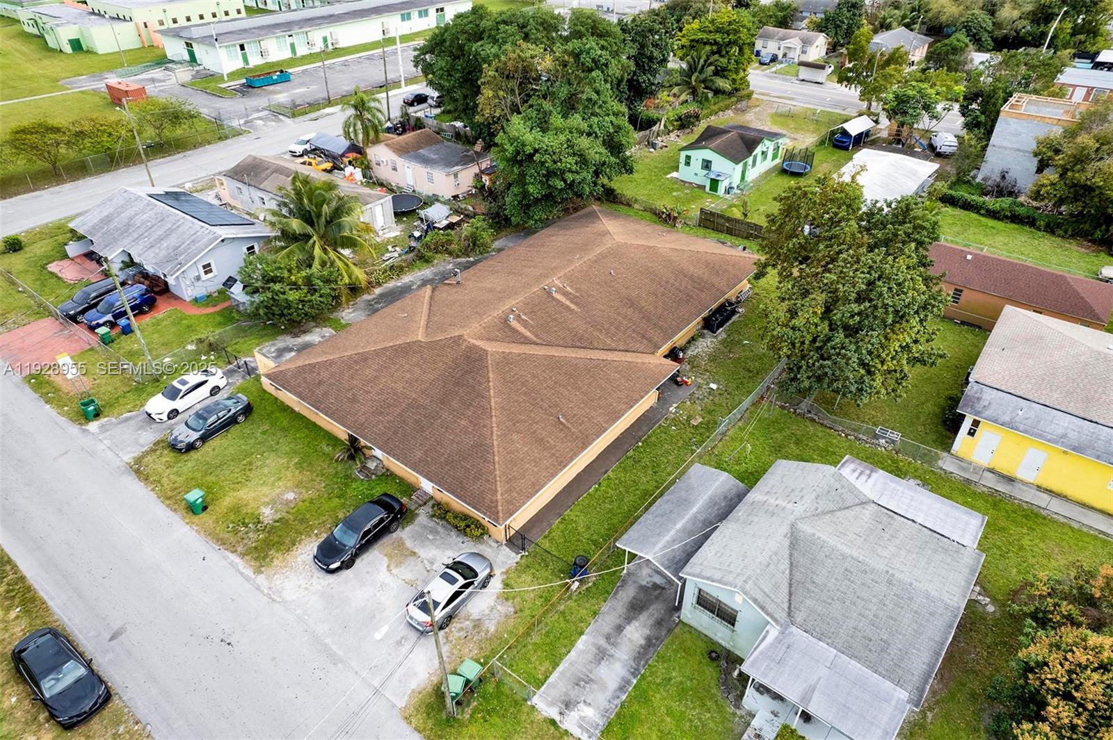 1910 Northwest 72nd Street Miami, FL 33147 - Photo 5 of 37 an aerial view of a house