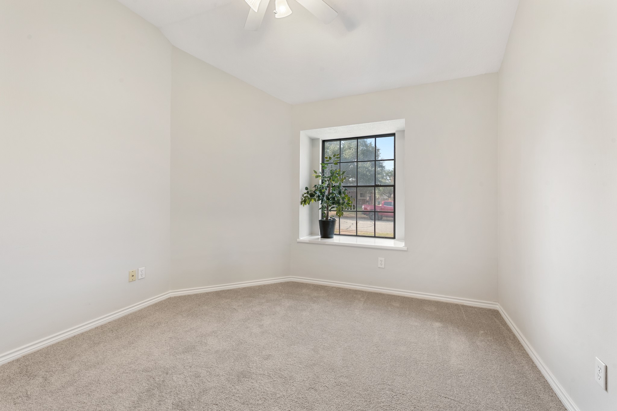 4505 Kensington Road Bryan, TX 77802 - Photo 22 of 26 Bedroom #2 with walk in closet , this room was updated with new carpet and fresh paint.