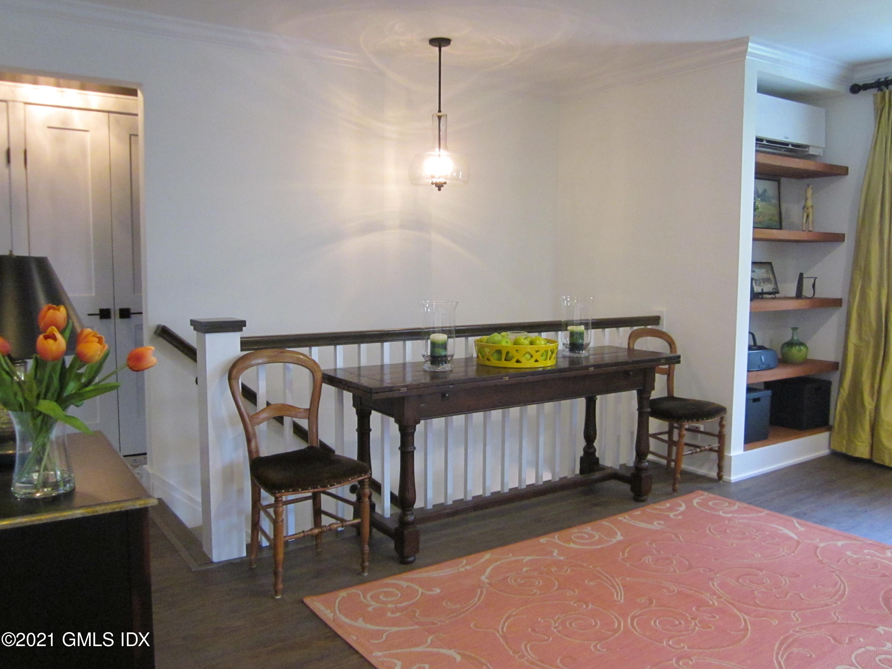 4 Putnam Park, Unit 4 Greenwich, CT 06830 - Photo 18 of 37 a living room with furniture