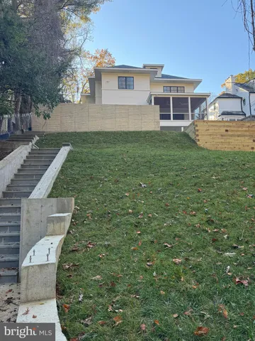 a picture of a bench in front of a window