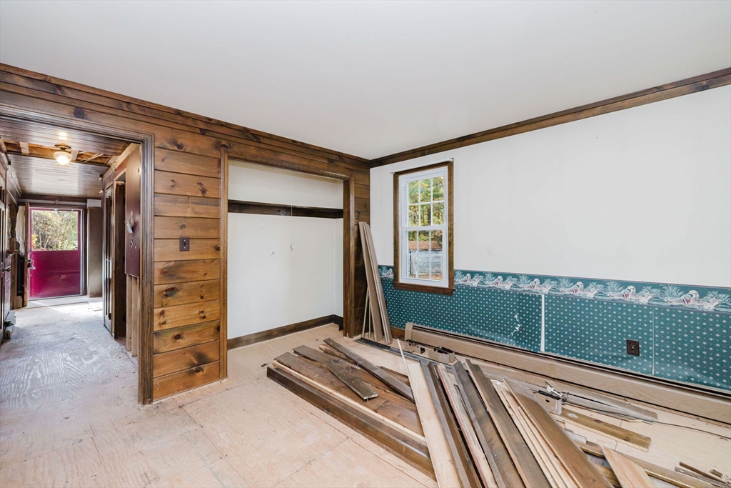 150 Quanapoag Road Freetown, MA 02717 - Photo 27 of 42 a bedroom with a bed and a window