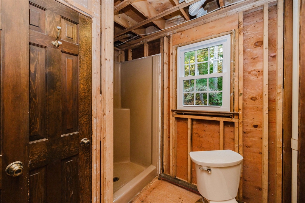 150 Quanapoag Road Freetown, MA 02717 - Photo 28 of 42 a bathroom with a toilet a sink and shower