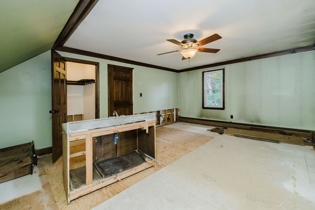 150 Quanapoag Road Freetown, MA 02717 - Photo 36 of 42 a view of a livingroom with furniture and chandelier fan