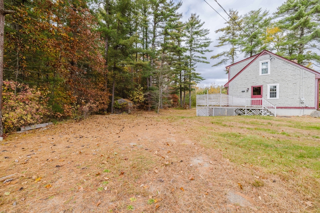 150 Quanapoag Road Freetown, MA 02717 - Photo 9 of 42 a view of a house with a yard
