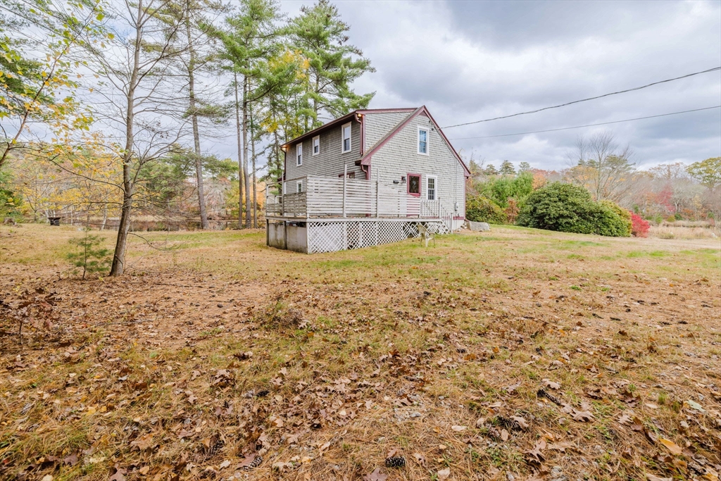 150 Quanapoag Road Freetown, MA 02717 - Photo 10 of 42 a view of a house with a yard
