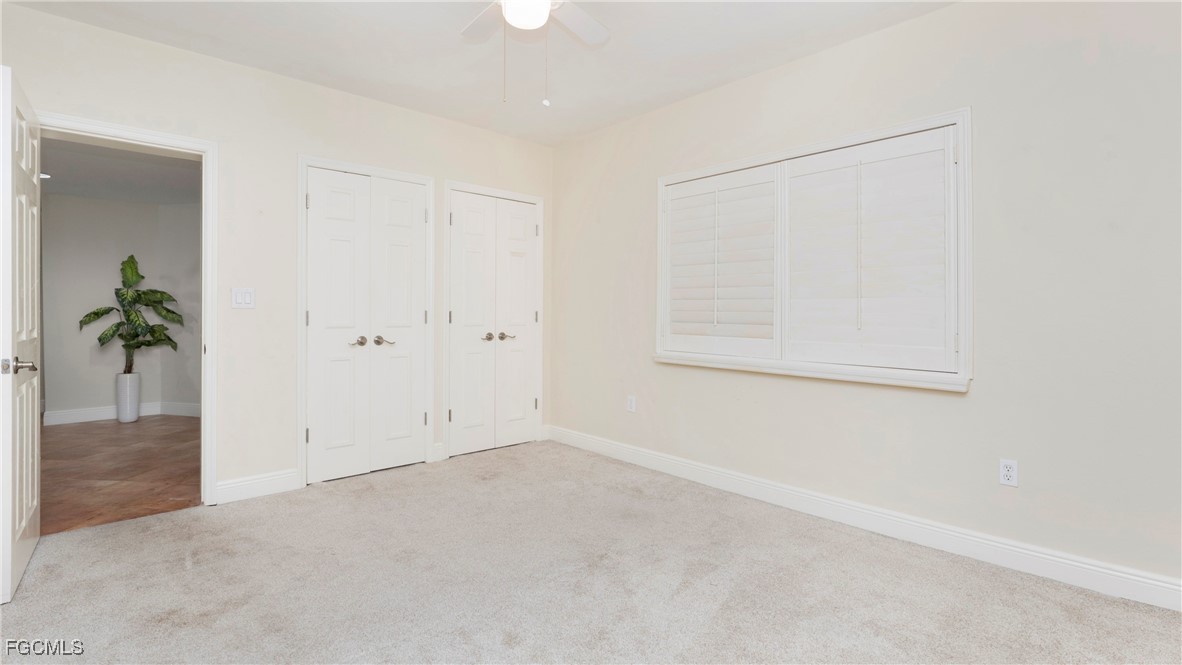 1920 Virginia Avenue, Unit 202 Fort Myers, FL 33901 - Photo 18 of 38 an empty room with potted plant