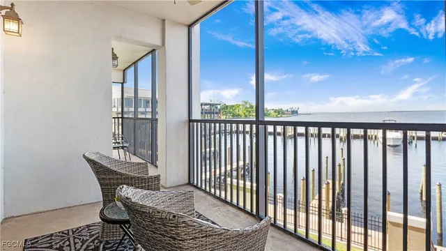 a view of a balcony with furniture