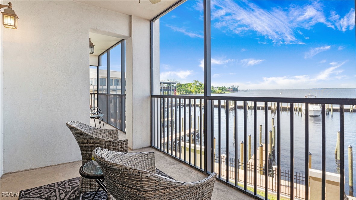 1920 Virginia Avenue, Unit 202 Fort Myers, FL 33901 - Photo 2 of 38 a view of balcony with wooden floor