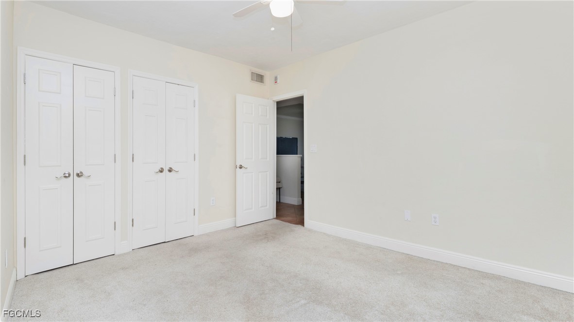 1920 Virginia Avenue, Unit 202 Fort Myers, FL 33901 - Photo 21 of 38 an empty room with closet area
