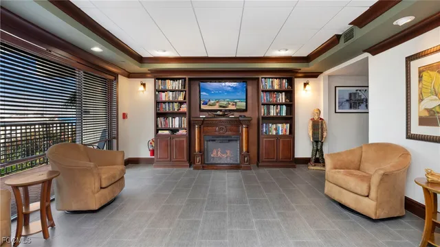 a kitchen with stainless steel appliances granite countertop a refrigerator a stove top oven a sink and dishwasher