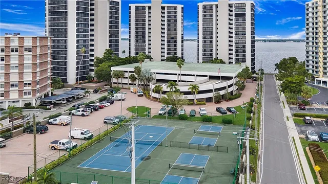 a view of a balcony with chairs