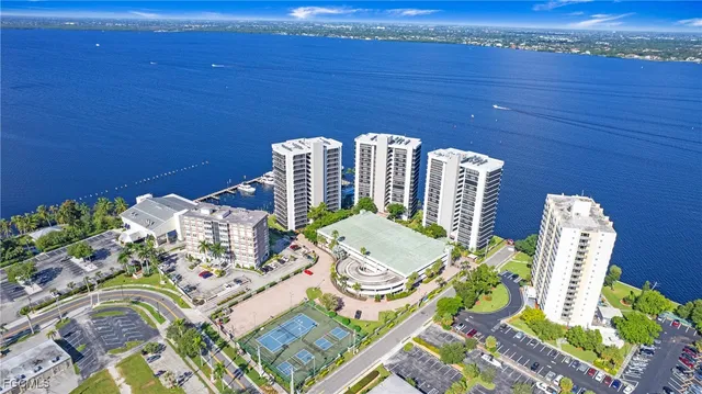 a view of a lake with a large building