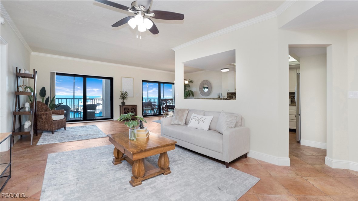 1920 Virginia Avenue, Unit 202 Fort Myers, FL 33901 - Photo 5 of 38 a living room with furniture and wooden floor