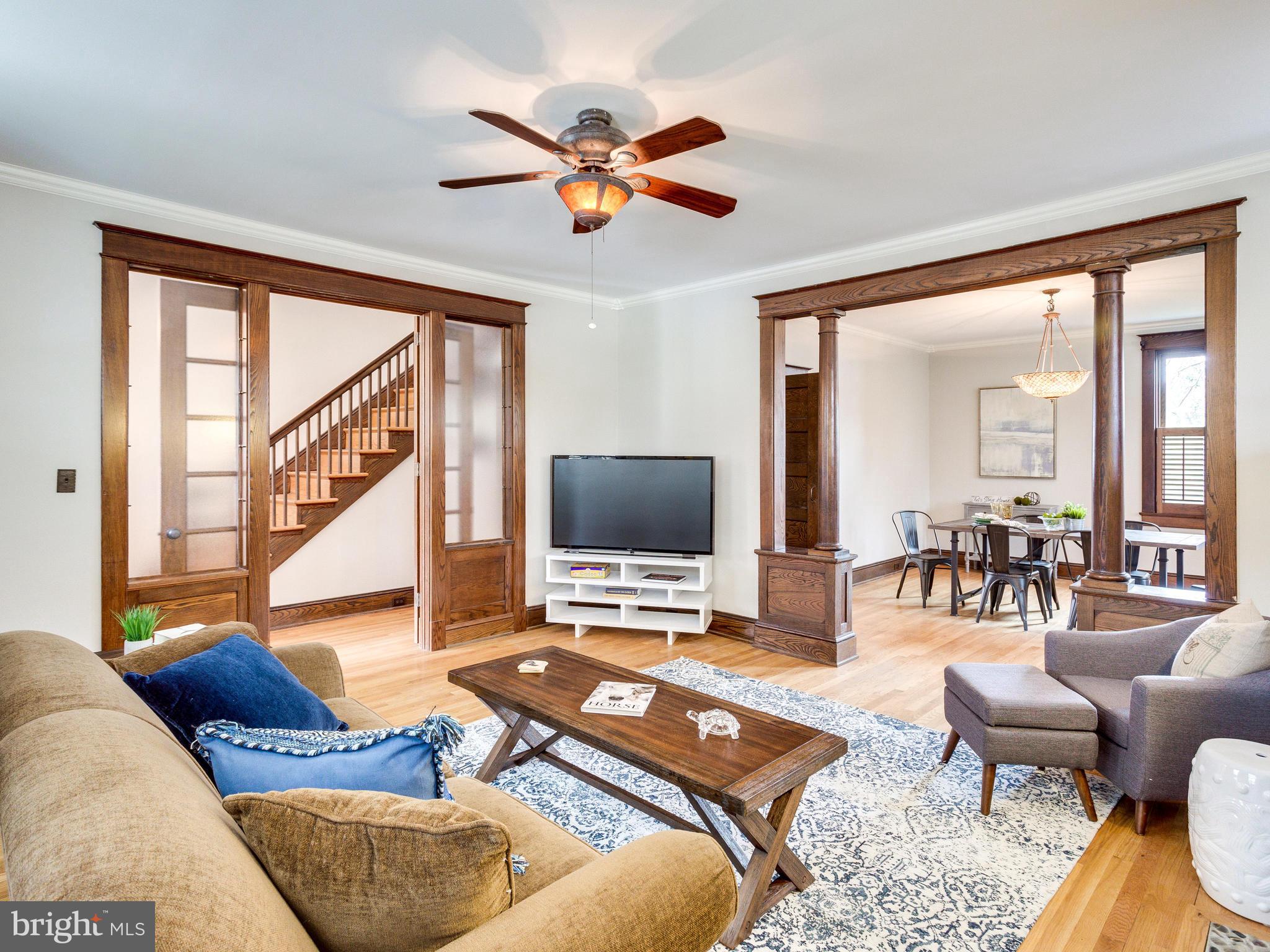 1107 Russell Road Alexandria, VA 22301 - Photo 1 of 29 a living room with furniture and a large window