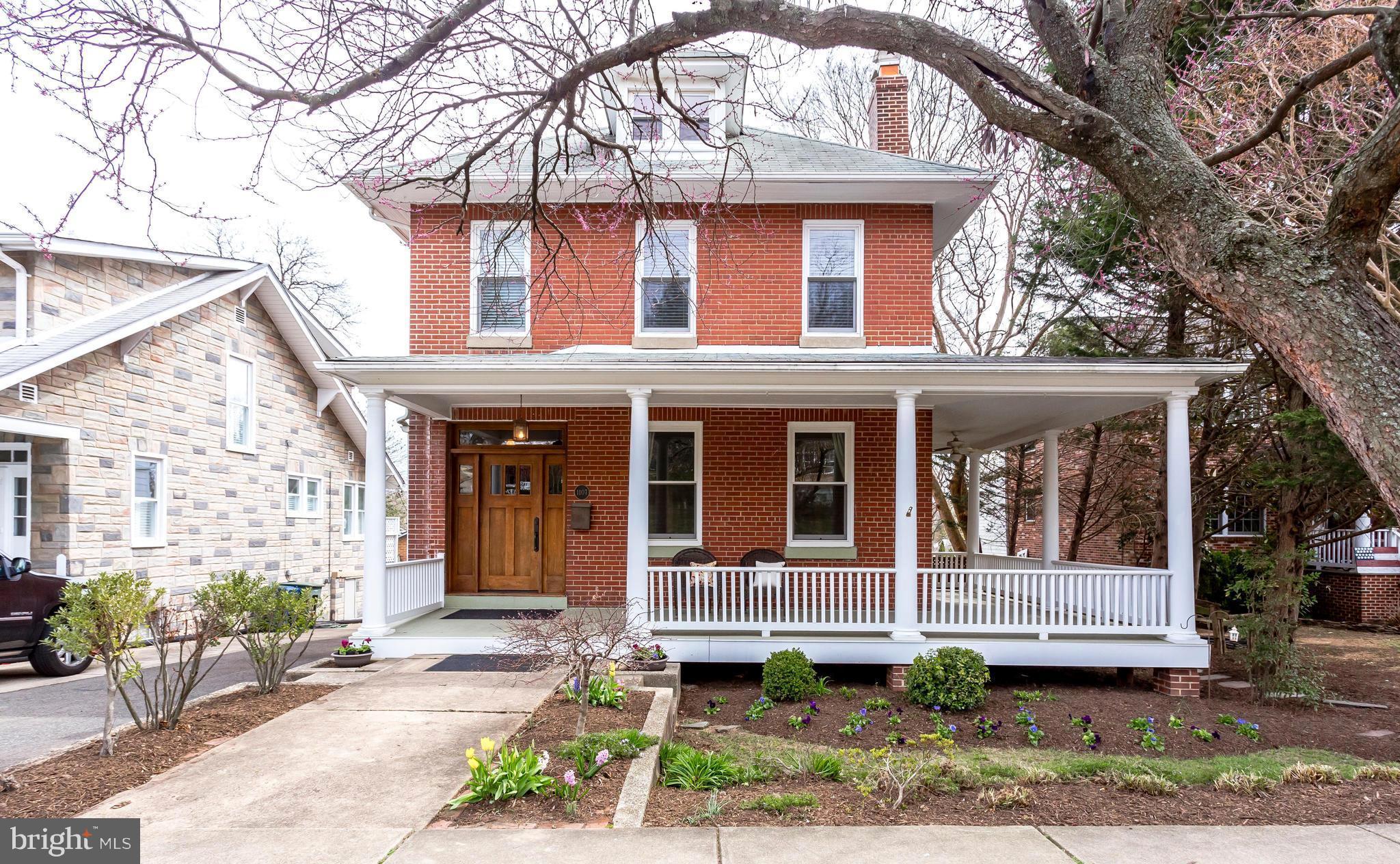 1107 Russell Road Alexandria, VA 22301 - Photo 2 of 29 a front view of a house with a porch
