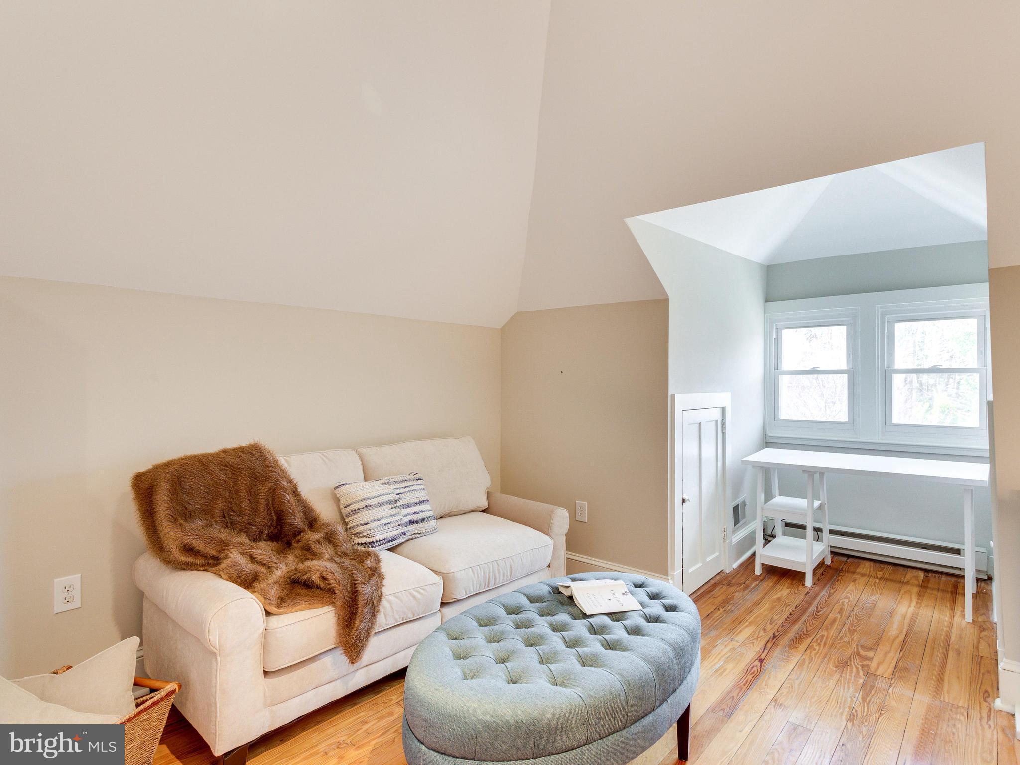 1107 Russell Road Alexandria, VA 22301 - Photo 16 of 29 a living room with furniture and a wooden floor