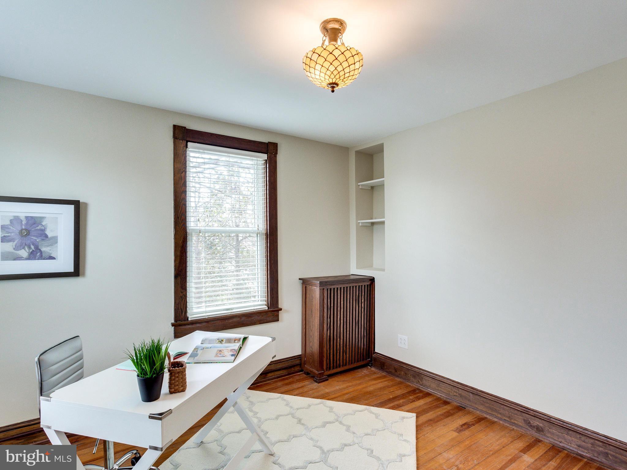 1107 Russell Road Alexandria, VA 22301 - Photo 20 of 29 a living room with furniture and a window