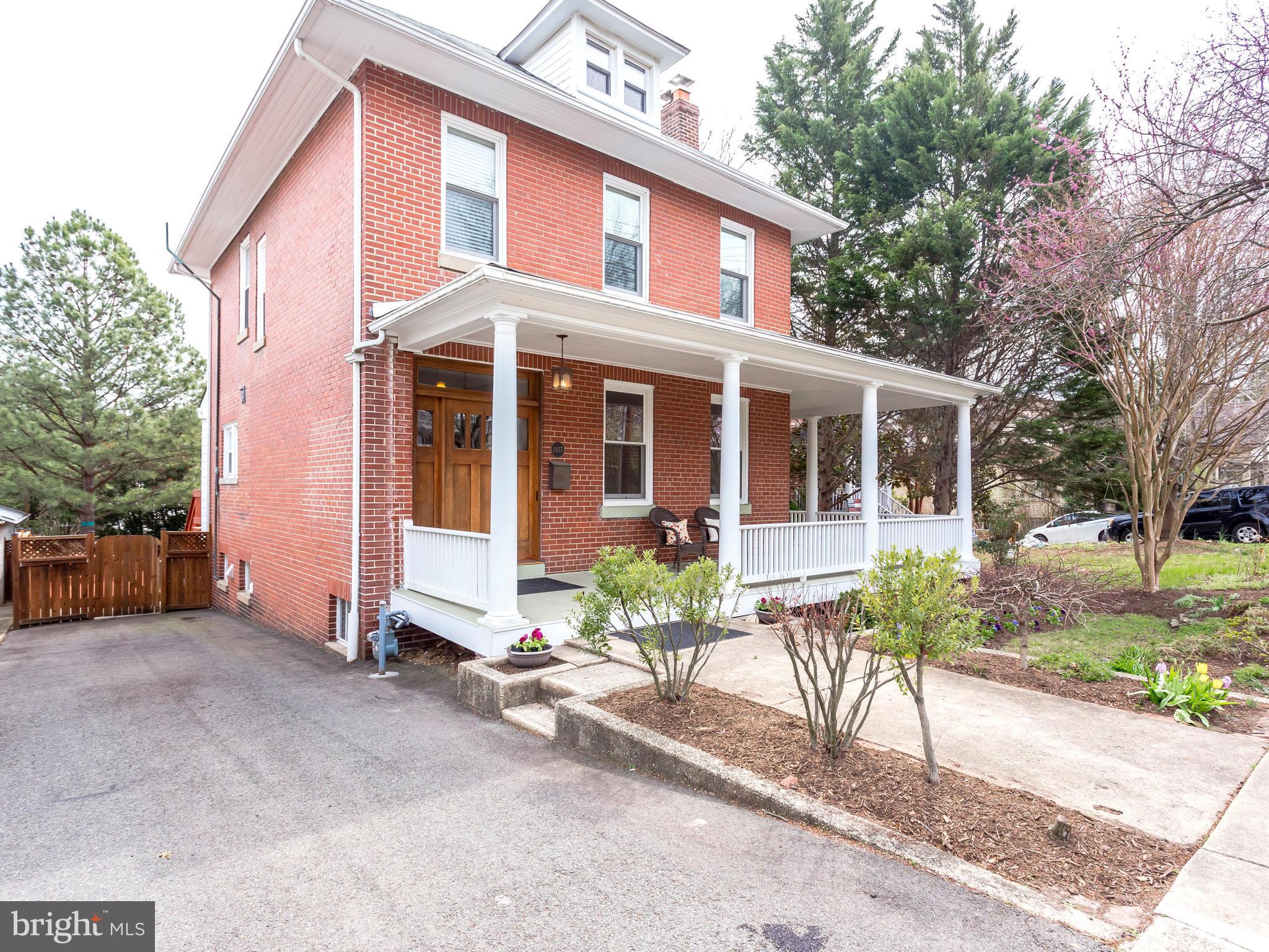 1107 Russell Road Alexandria, VA 22301 - Photo 29 of 29 a front view of a house with garden