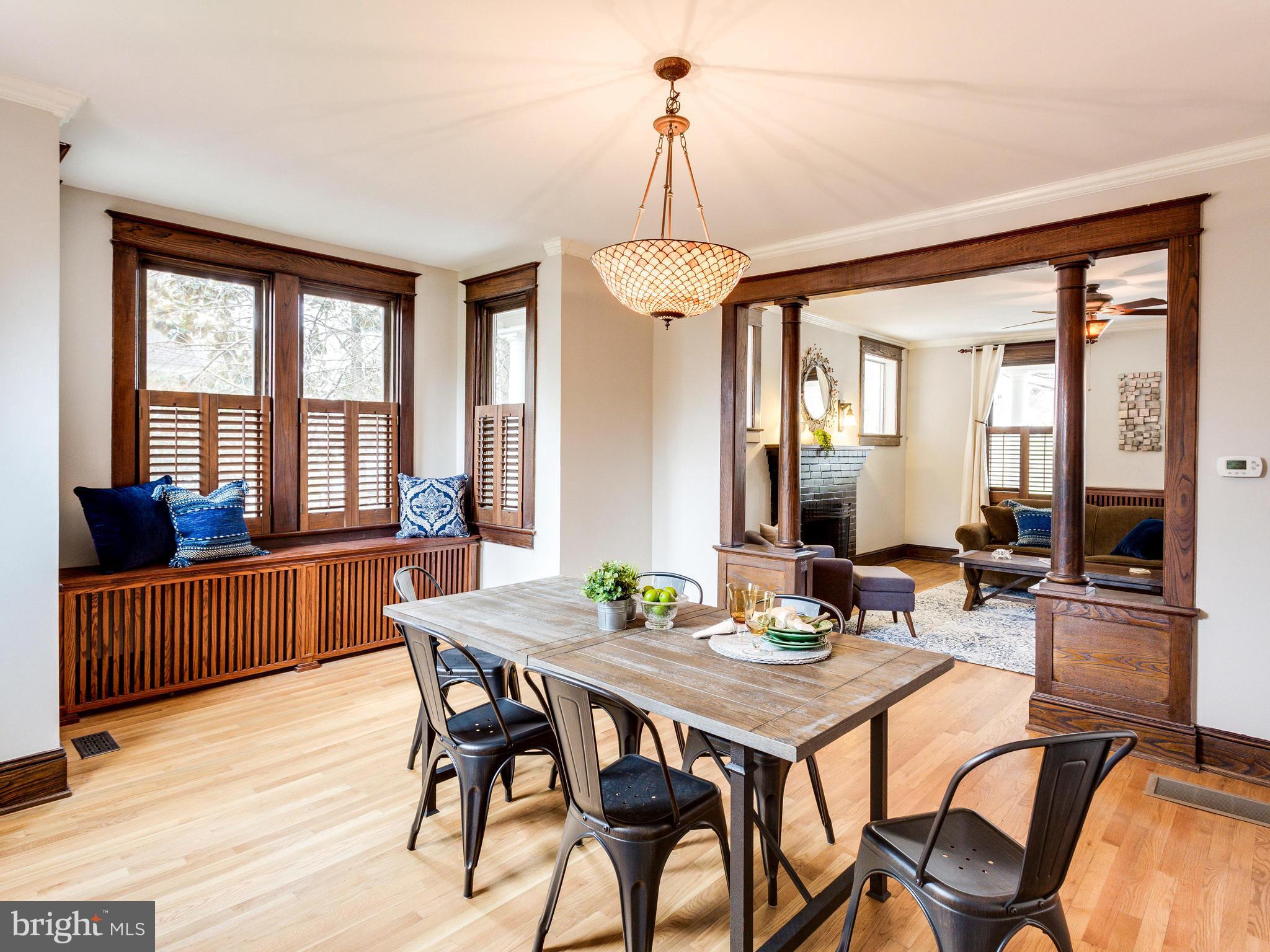 1107 Russell Road Alexandria, VA 22301 - Photo 7 of 29 a view of a dining room with furniture window and wooden floor