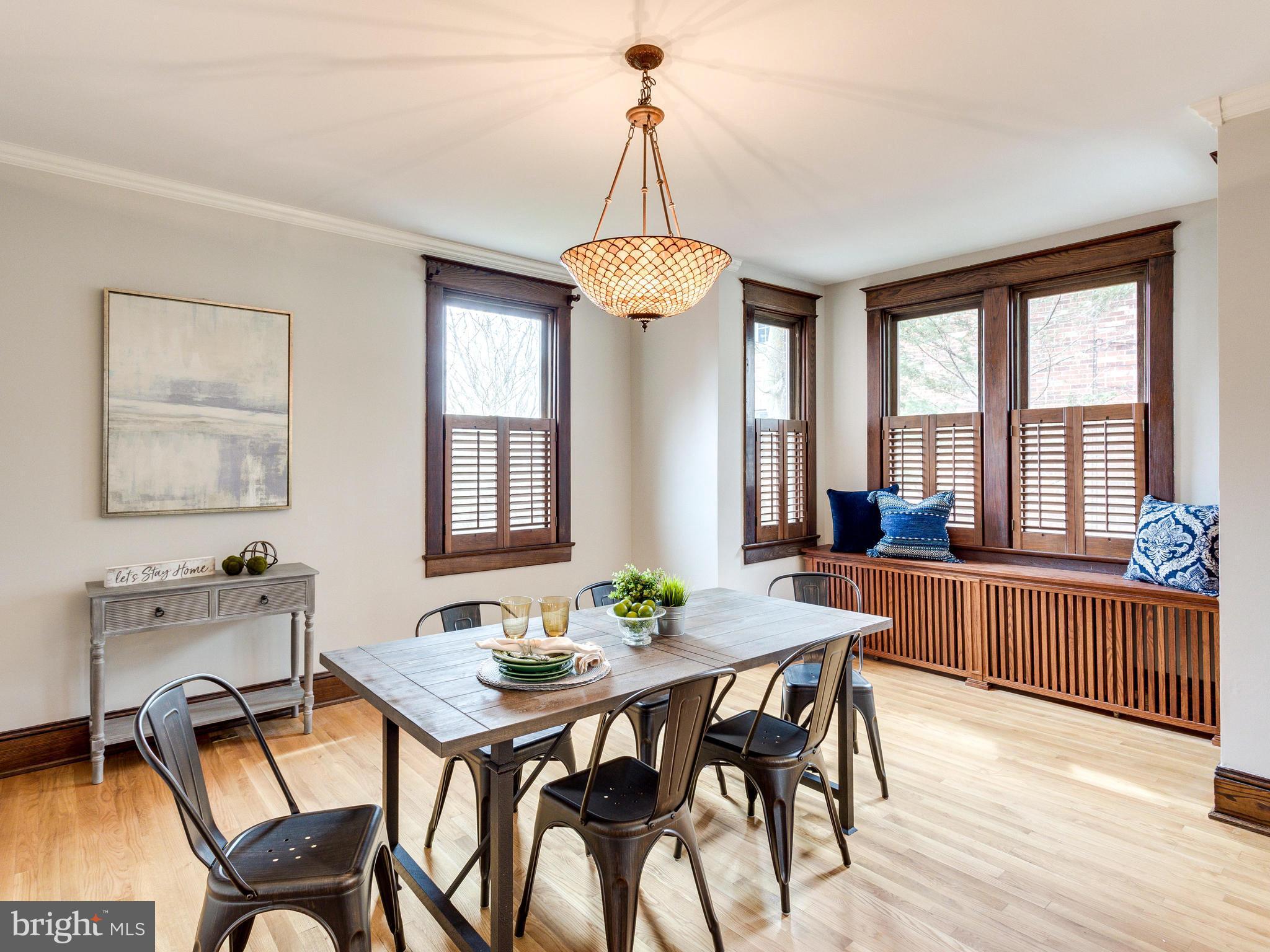 1107 Russell Road Alexandria, VA 22301 - Photo 8 of 29 a view of a dining room with furniture window and outside view