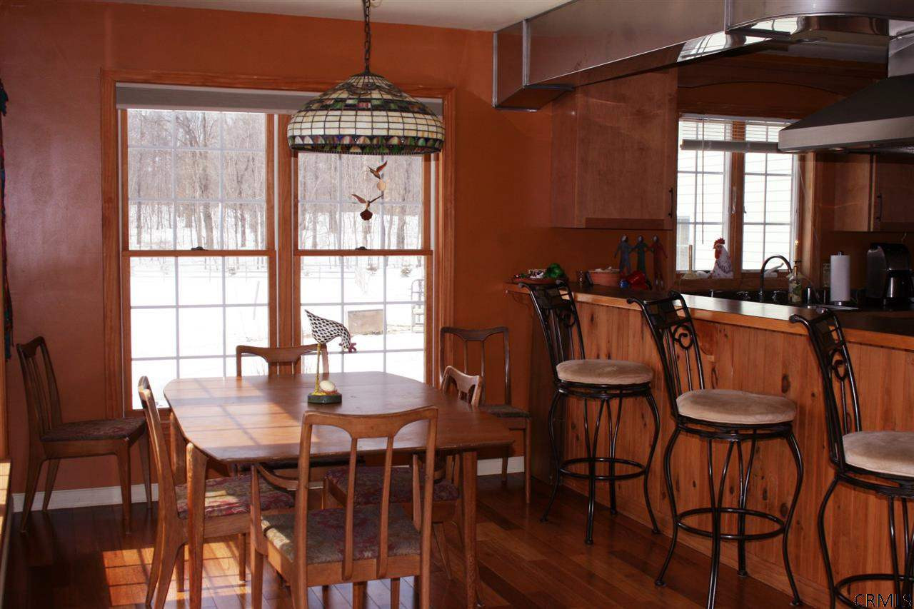 277 Higgins Road Hebron, NY 12832 - Photo 18 of 25 Well Lit Dinning Room Area