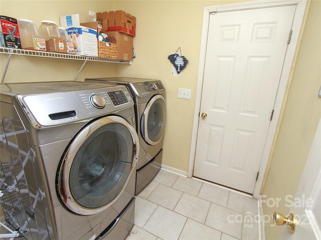 2011 Fairburn Court Fort Mill, SC 29708 - Photo 29 of 29 a utility room with dryer and washer