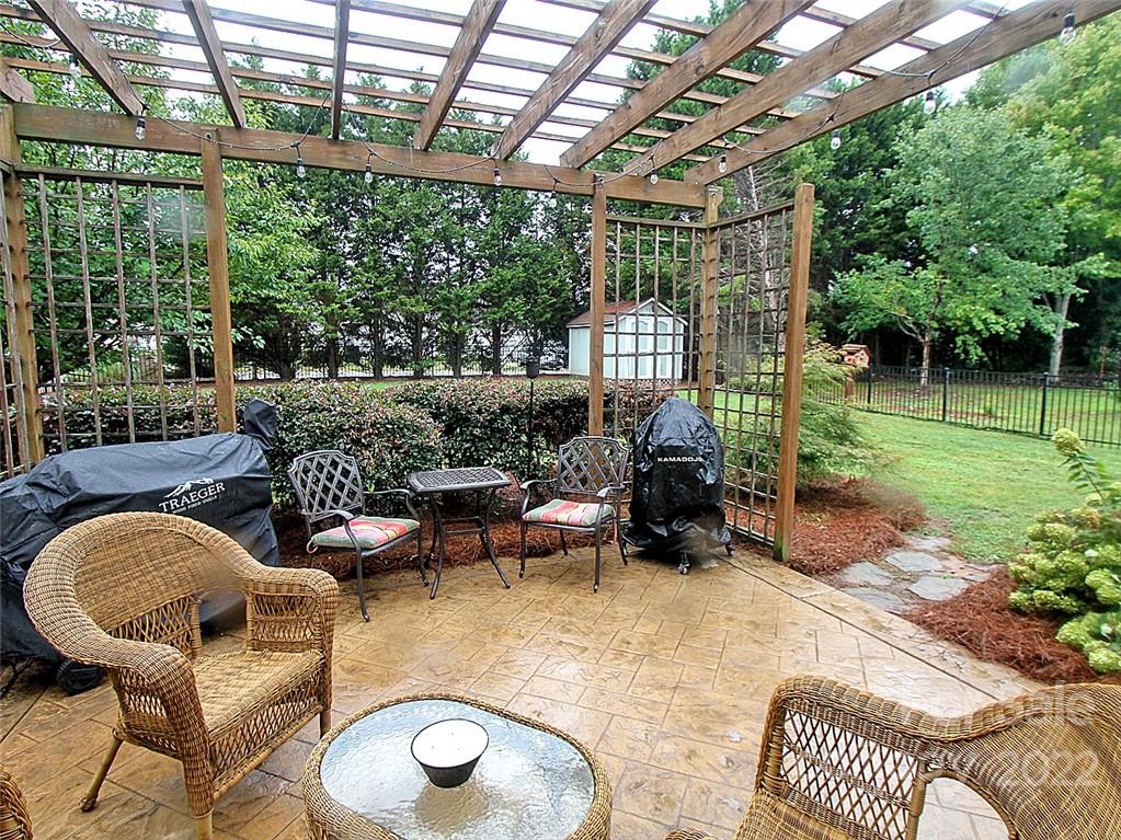 2011 Fairburn Court Fort Mill, SC 29708 - Photo 8 of 29 a outdoor living space with furniture and garden view