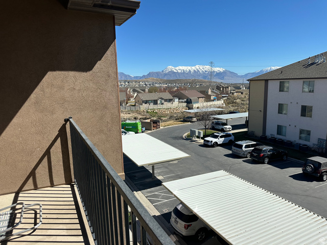 8215 Clear Rock Road, Unit 12 Eagle Mountain, UT 84005 - Photo 29 of 38 Balcony with a residential view and a mountain view