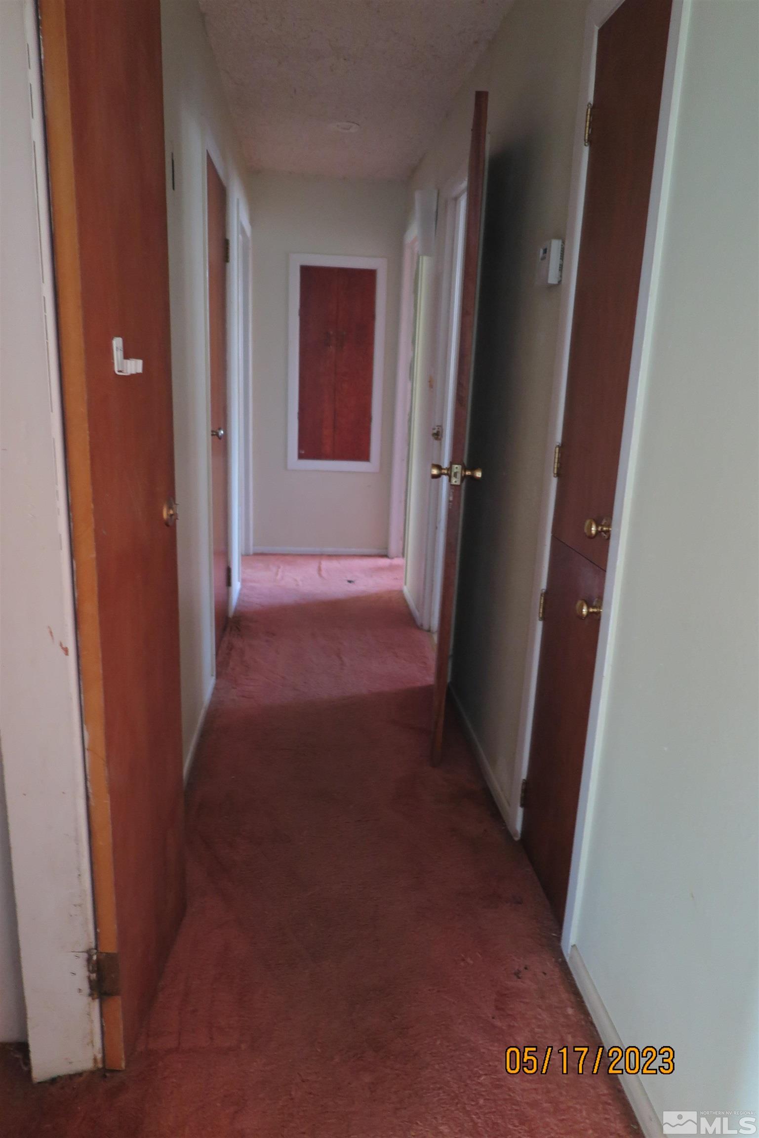 208 Rhodes Road Reno, NV 89521 - Photo 11 of 33 an empty room with windows