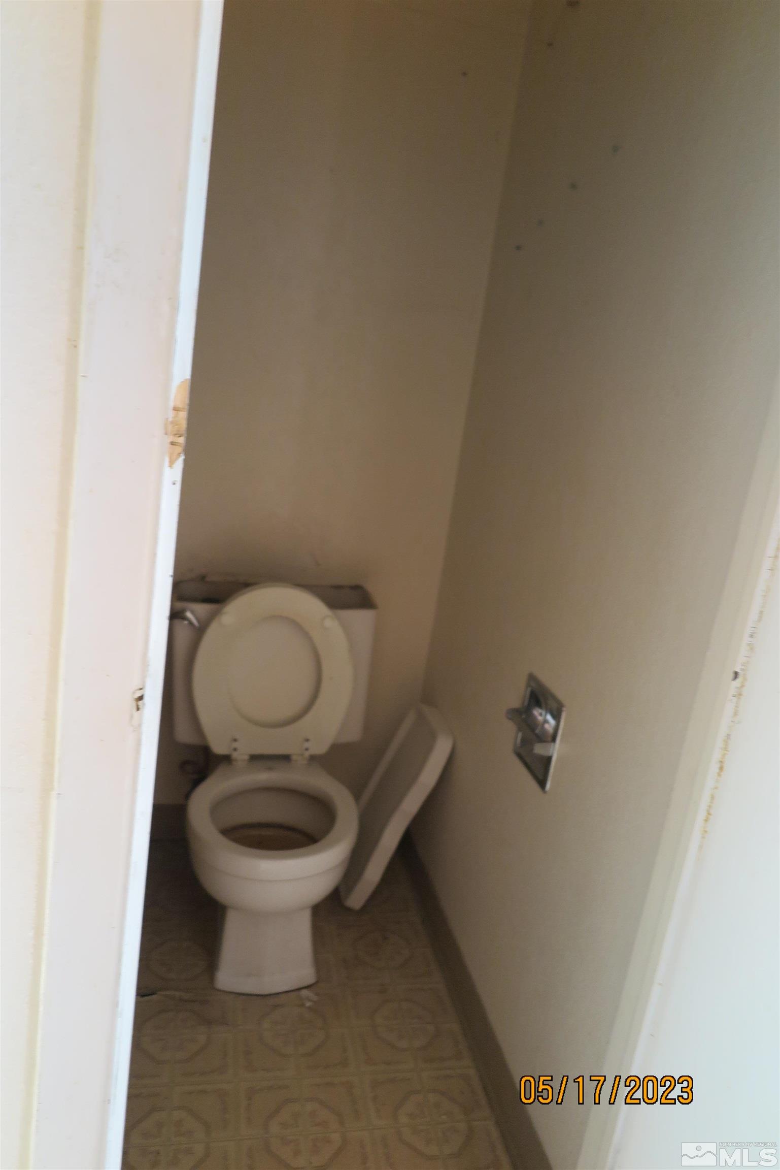 208 Rhodes Road Reno, NV 89521 - Photo 17 of 33 a white toilet sitting next to a white sink
